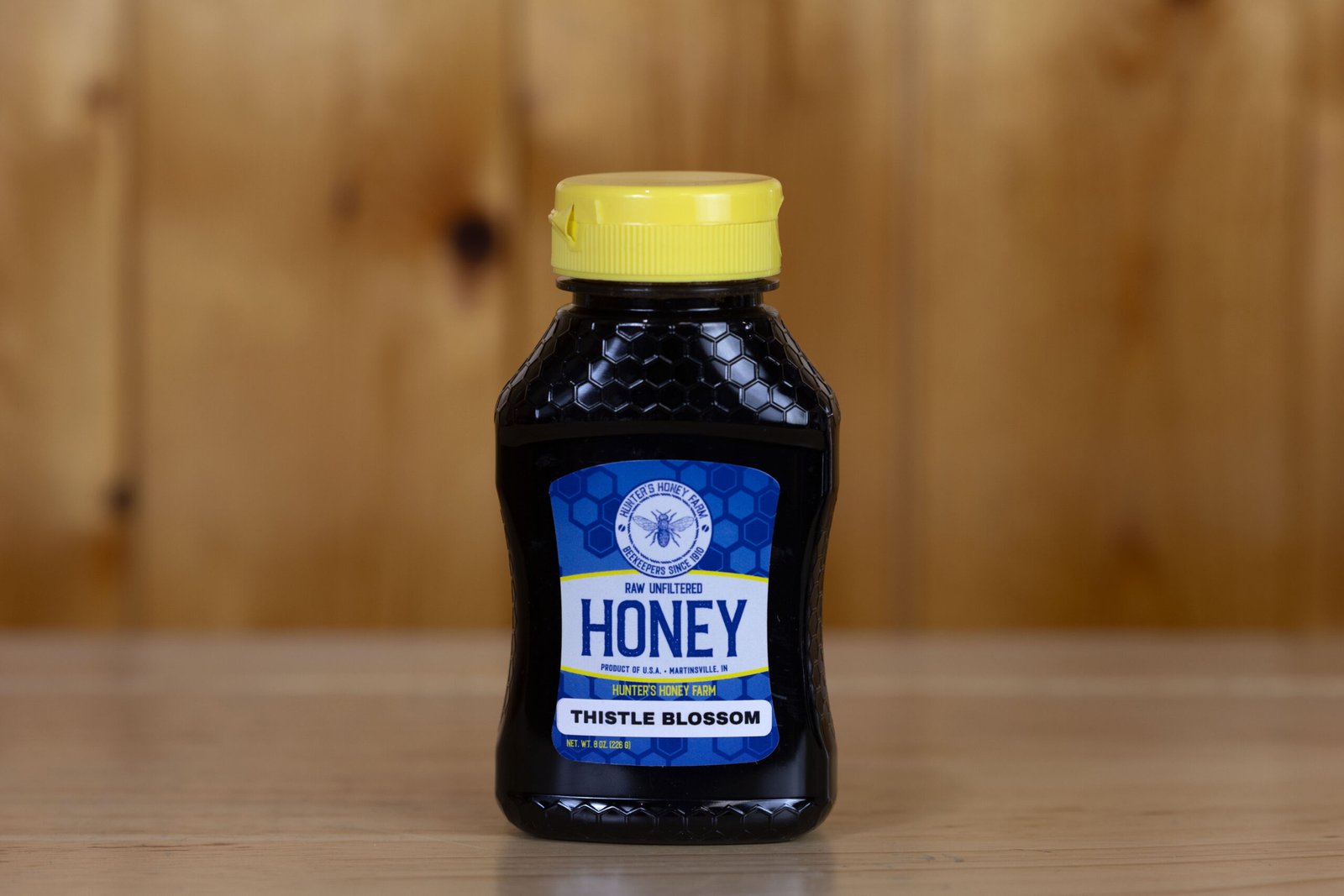Raw Thistle Blossom Honey · Bottle Size: 8 oz, Unit of Measure: Individual