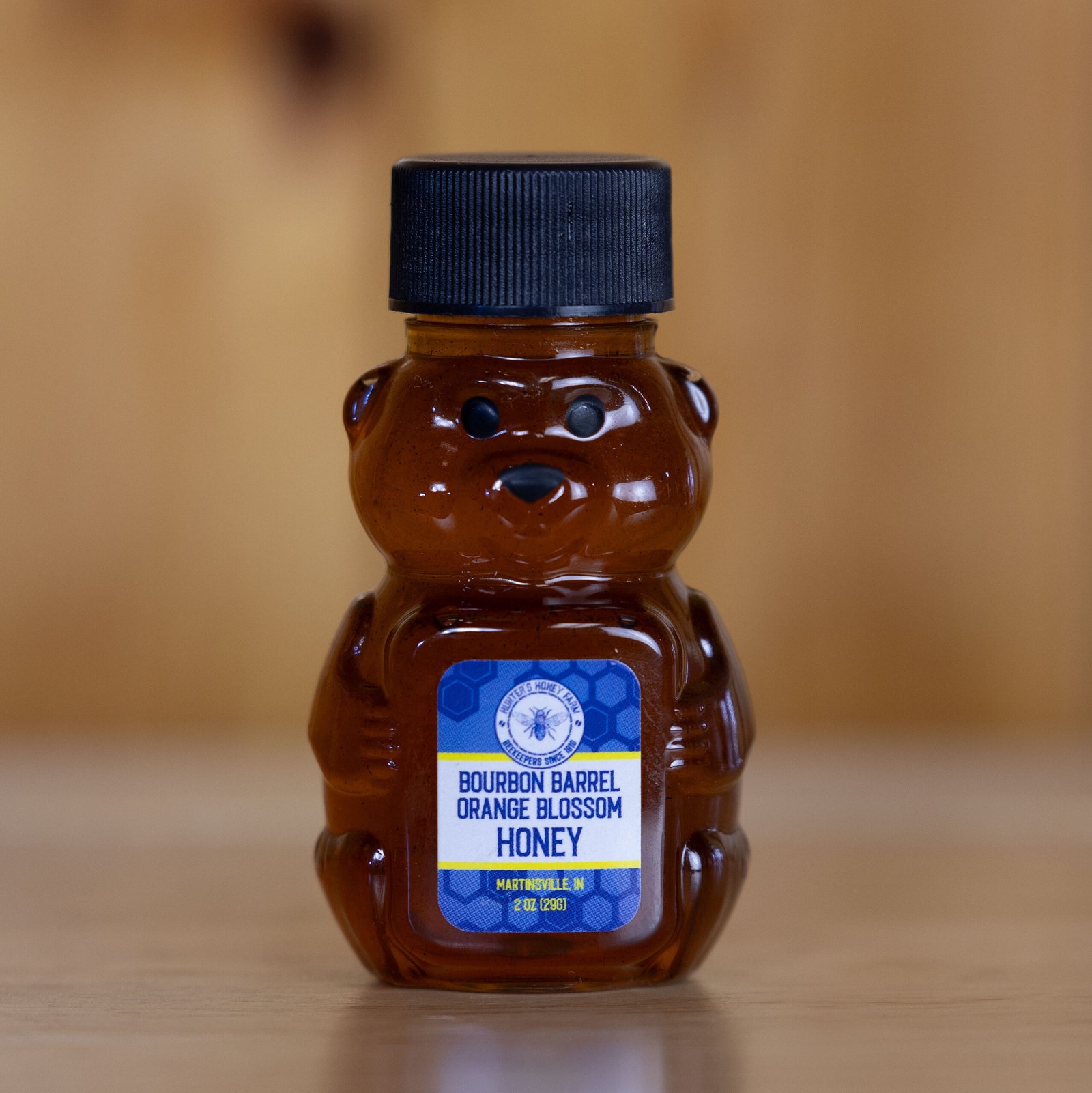 Bourbon Barrel Aged Raw Orange Blossom Honey · Unit of Measure: Case of 12 – 2oz Bottles